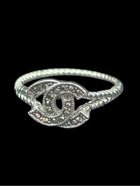 Vintage Silver-Tone Interlocking Logo Ring with Black Accents